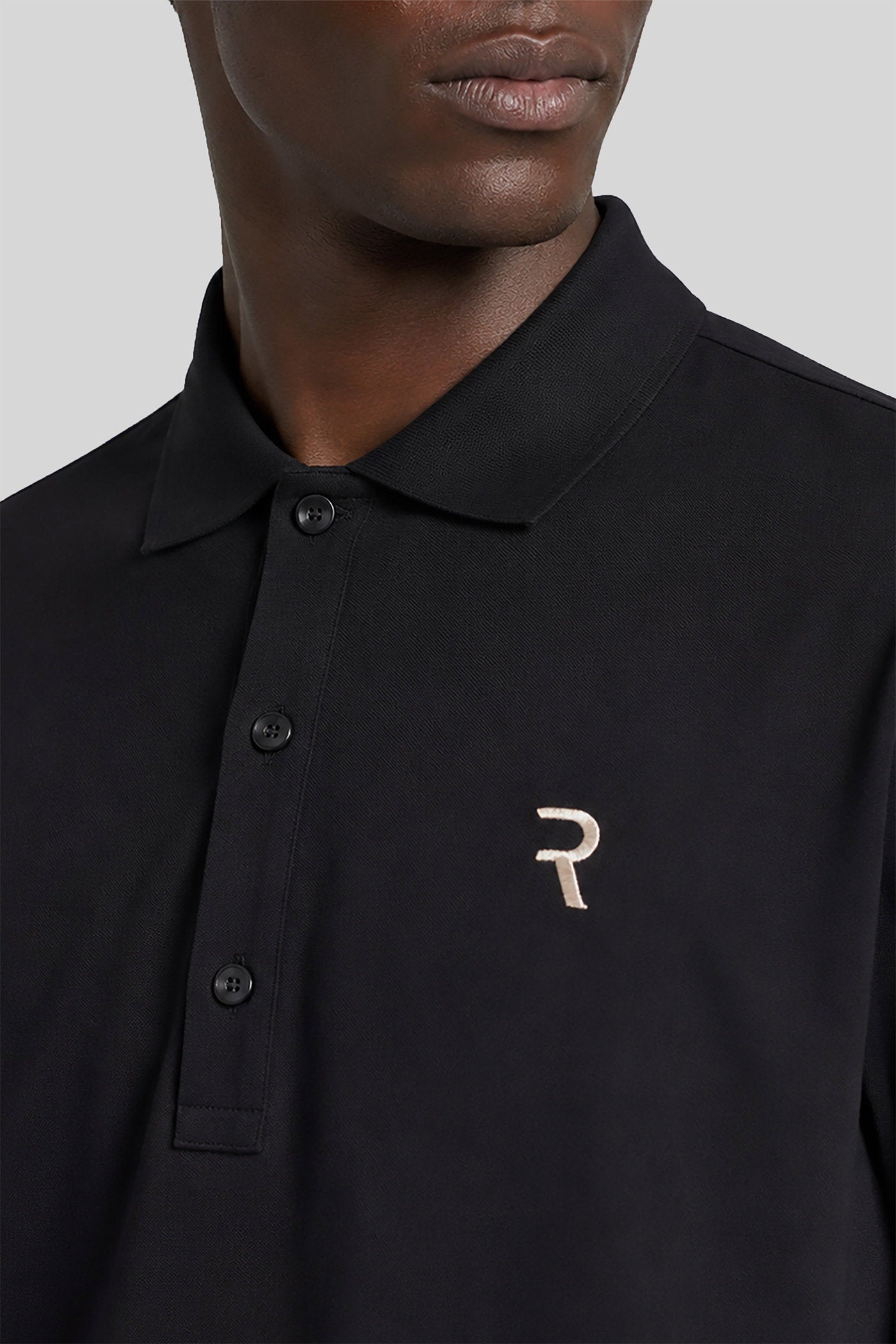 Polo in black cotton