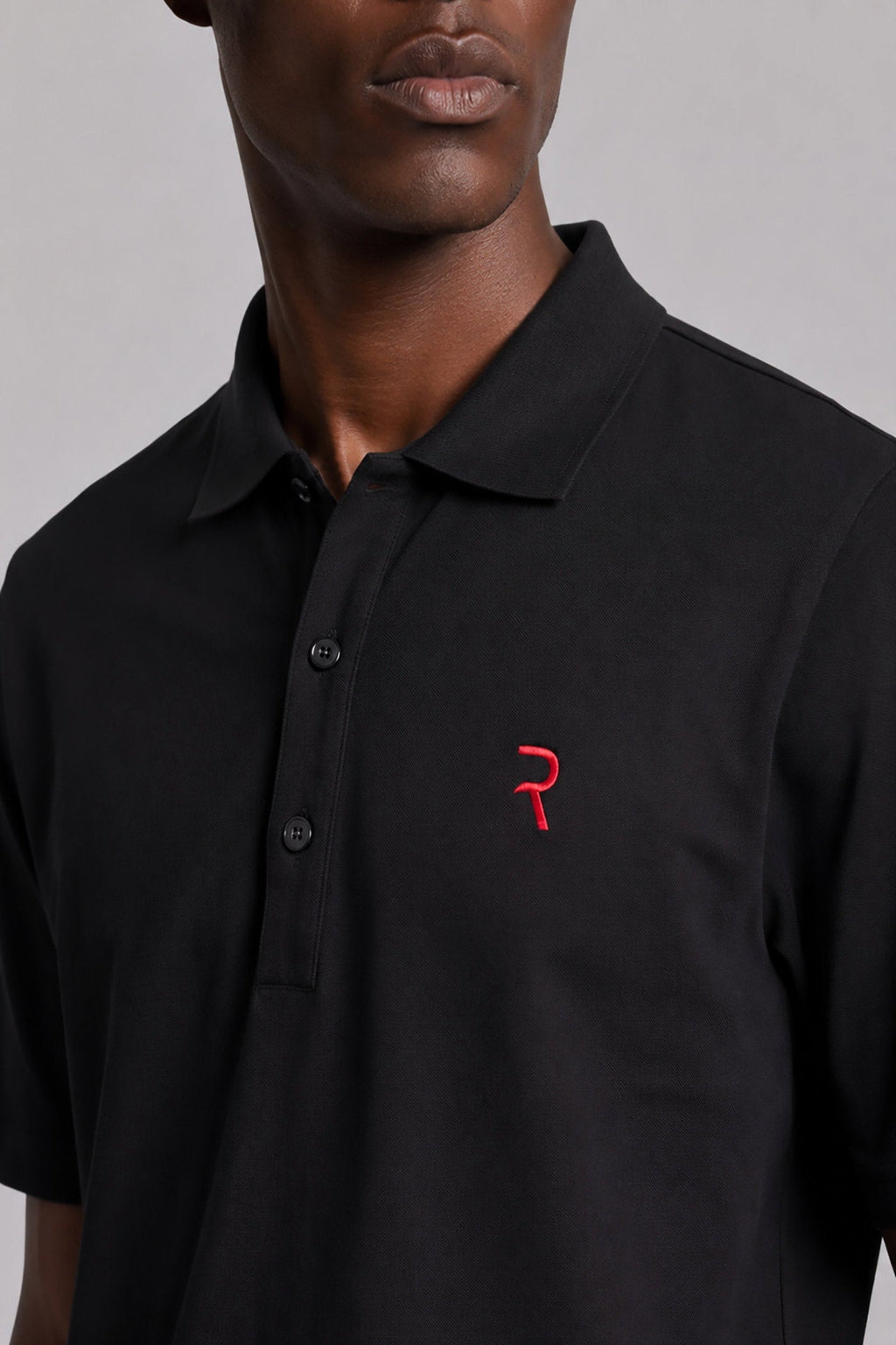 Polo in black cotton
